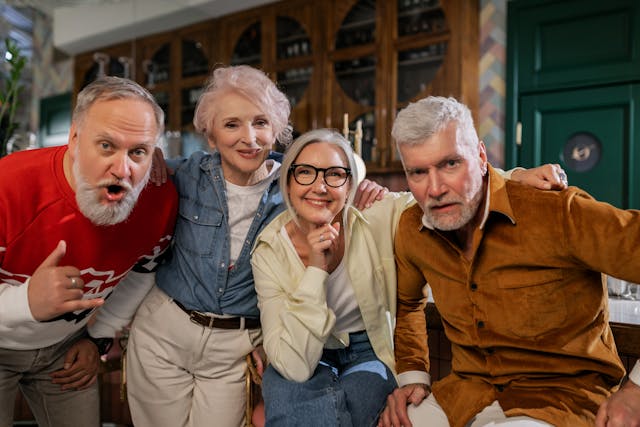 Four happy people in their 60s