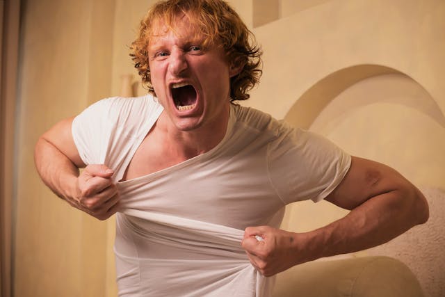 Man wth tight t-shirt
