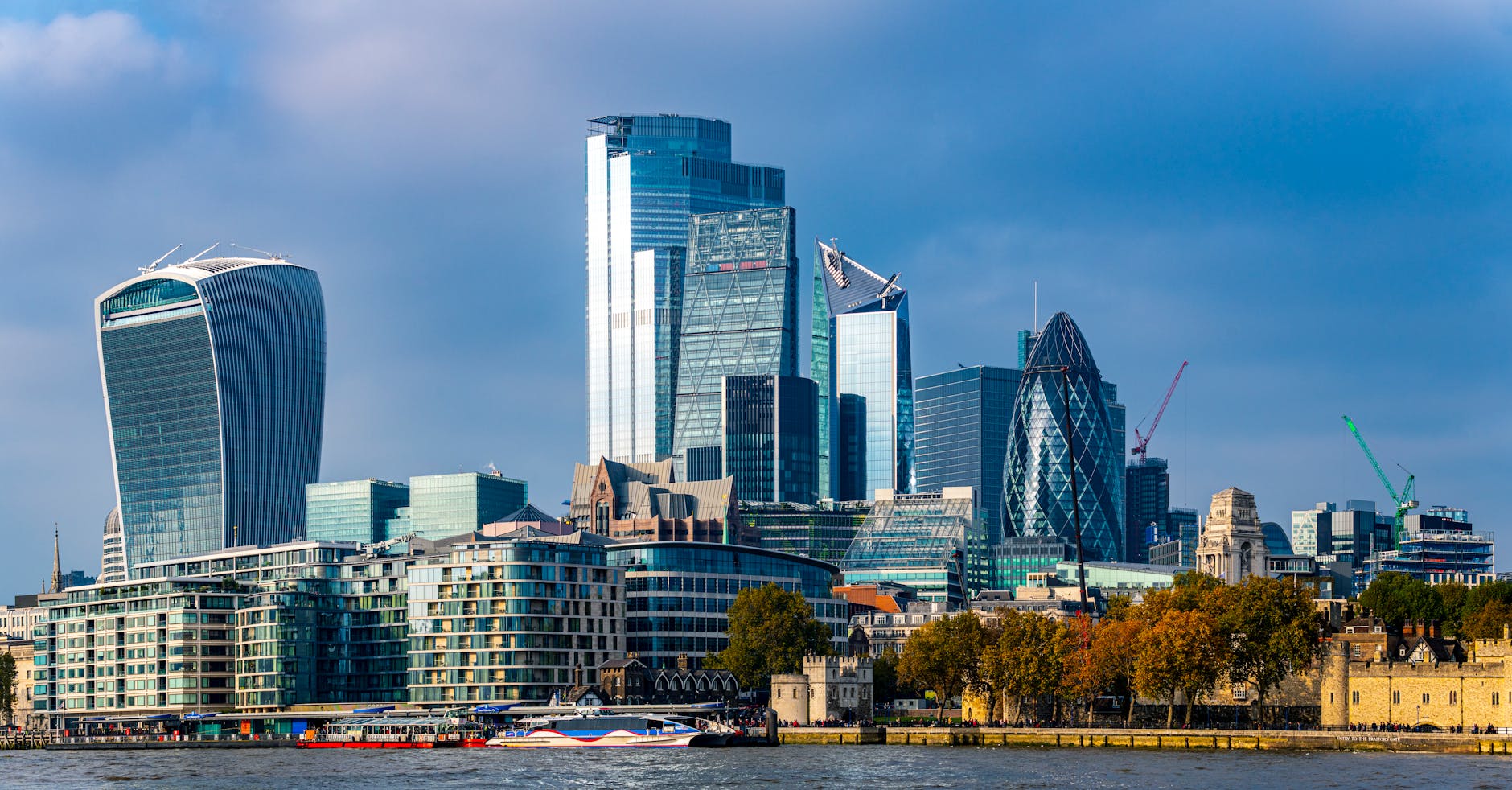 Stunning view of the London skyline featuring iconic skyscrapers along the River Thames.