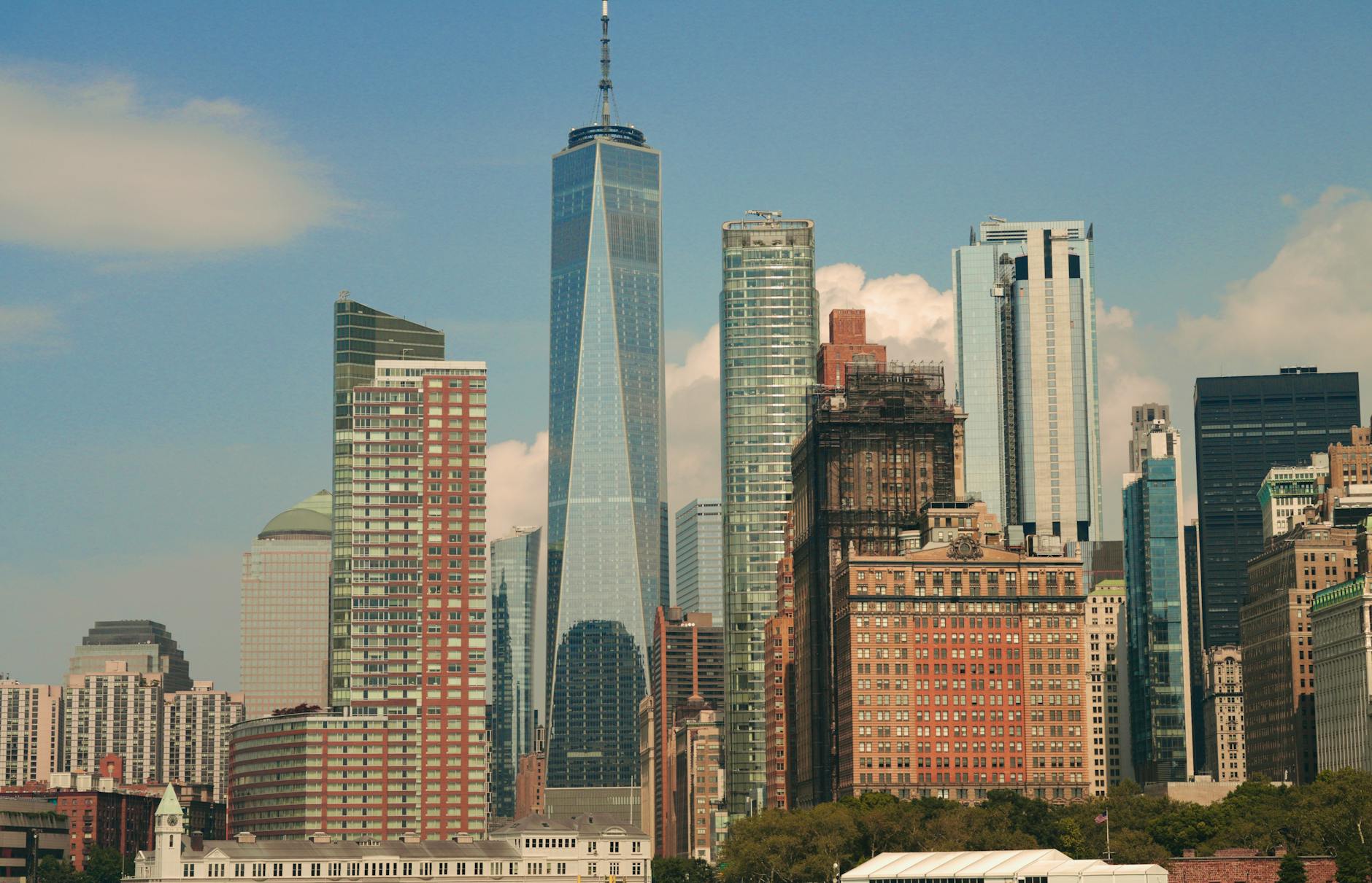 Impressive cityscape of New York City featuring the iconic One World Trade Center amidst modern skyscrapers.