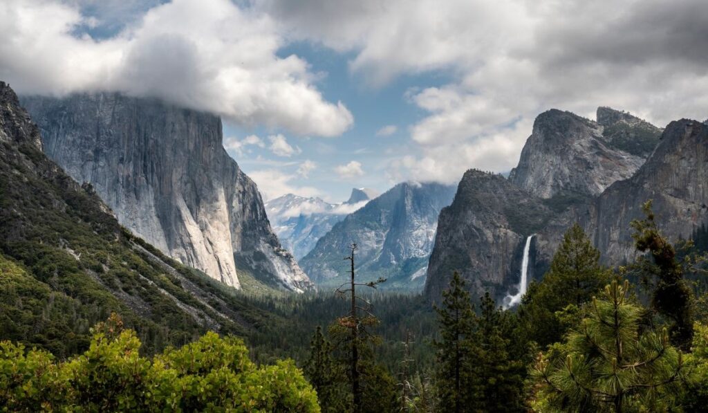 Yosemite national park, California, beautiful Tunnel View with waterfall. El Capitan with cloud on top