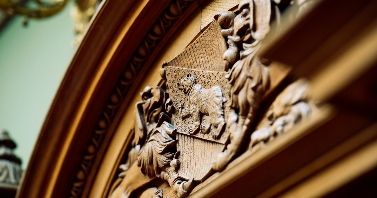 Close-up of ornate wooden carving in Bern, capturing intricate details.