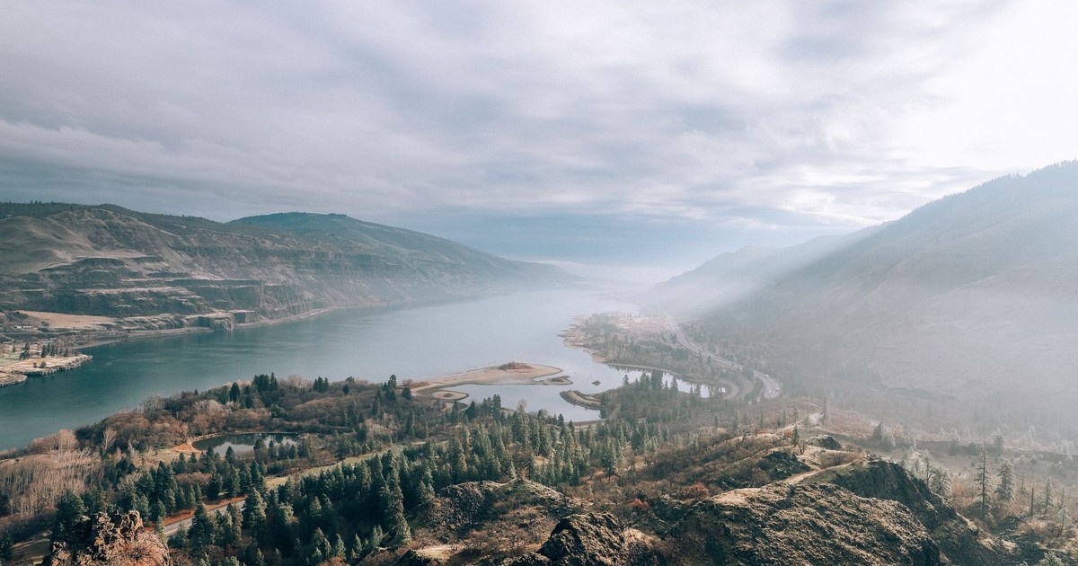 Beautiful landscape of Columbia River Gorge with misty mountains and lush forest in Mosier, Oregon