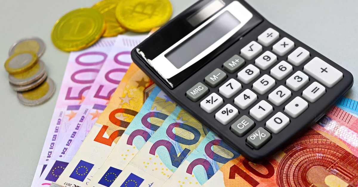 Image of euro banknotes, coins, and a calculator for financial planning. Perfect for finance themes.