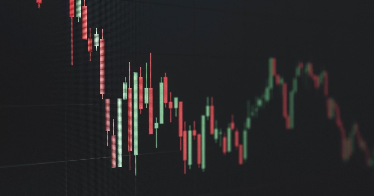 Stock market data chart showing trends in red and green. Perfect for financial and business themes.