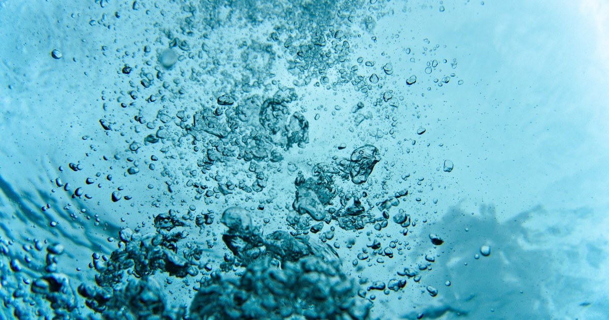 Captivating underwater bubbles showcasing the purity and vibrancy of Caraga's clear blue waters.