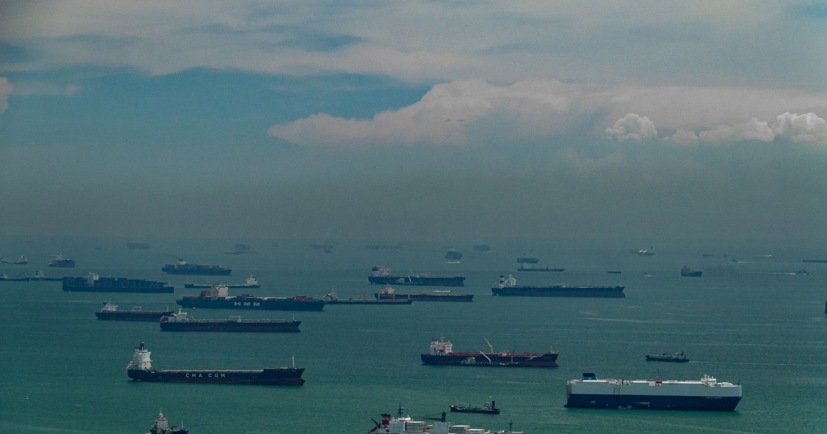 Vast number of cargo ships navigating through Singapore's busy maritime strait.