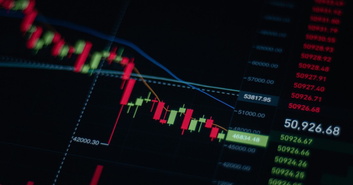 Close-up of stock market chart showing trends and data on a digital screen.