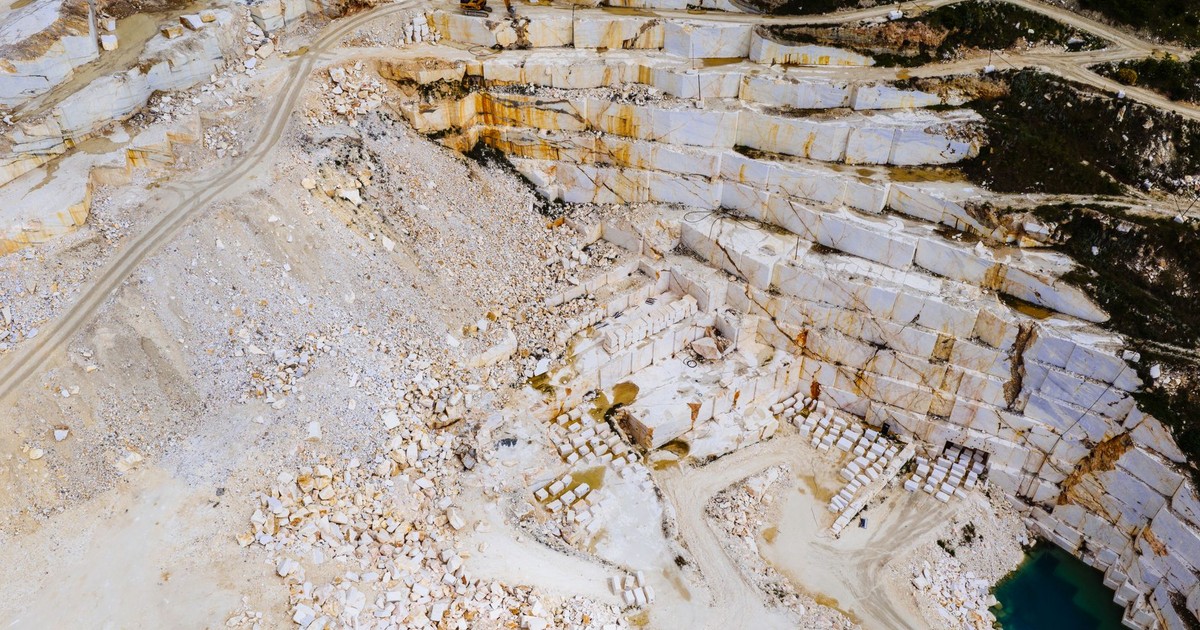 Stunning aerial shot of a marble quarry in Thessaloniki, Greece showcasing the intricate patterns and colors.
