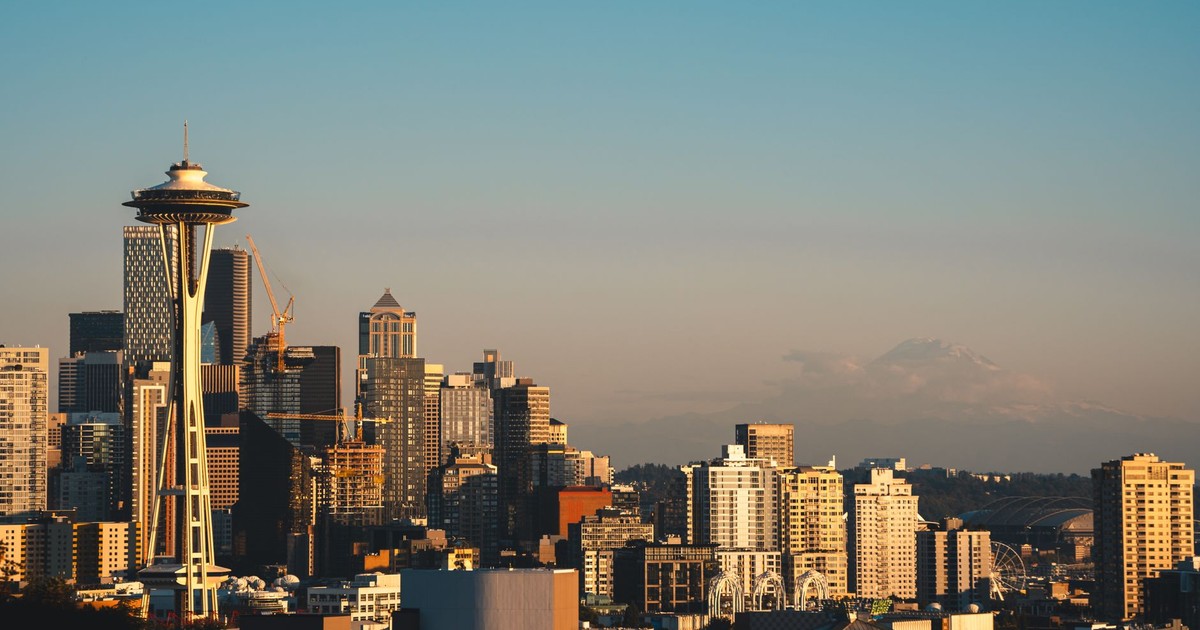 Stunning view of Seattle's skyline featuring the iconic Space Needle during sunset.