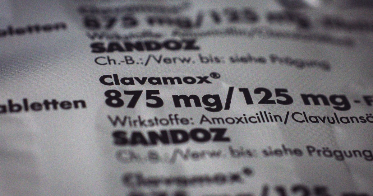 Close-up of a Clavamox package showing dosage and ingredients in focus.
