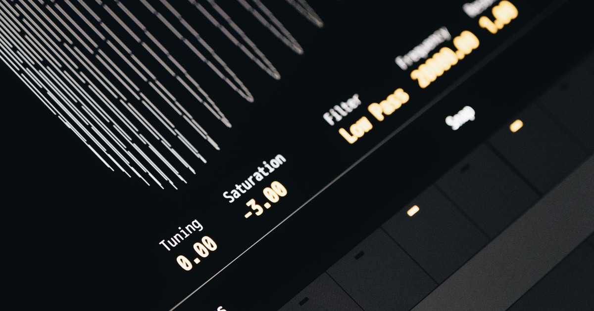 Close-up of a modern digital sound interface screen displaying tuning, saturation, and filter settings.