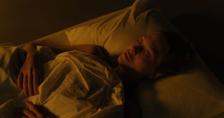 Sleeping With a Fan On? Doctors Share What That Does to Your Body and Health - Featured image