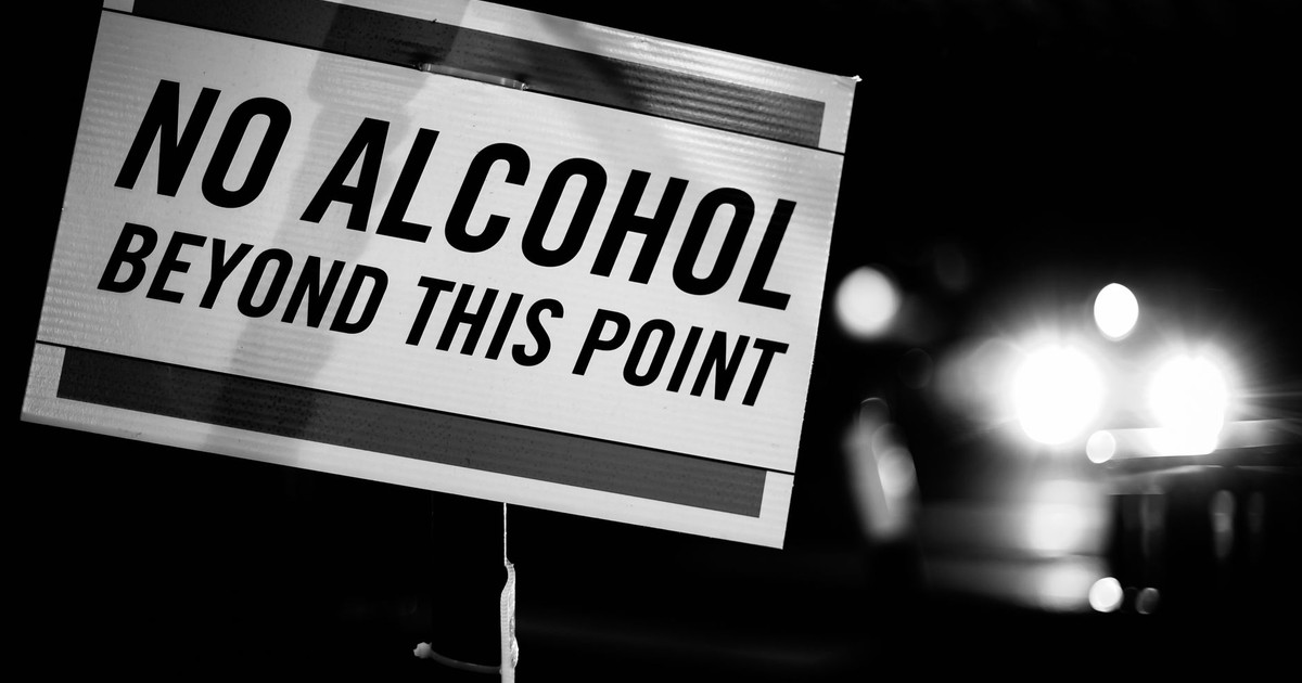 Black and white of forbidding inscription with words No Alcohol Beyond This Point