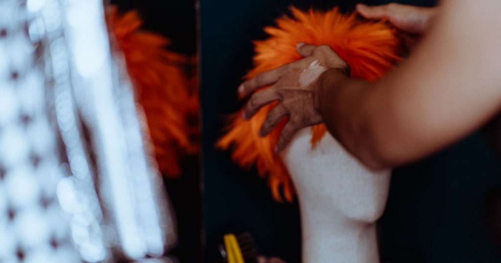 Woman Turns Workplace Hair Ban Into Viral Wig Protest - Featured image