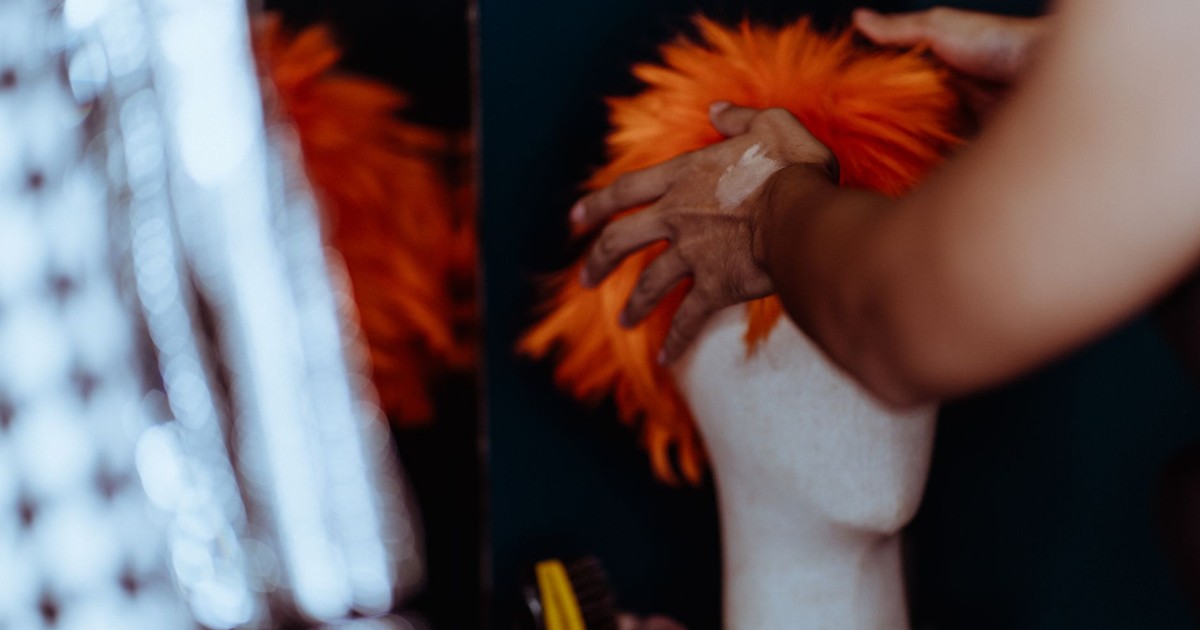 Woman Turns Workplace Hair Ban Into Viral Wig Protest