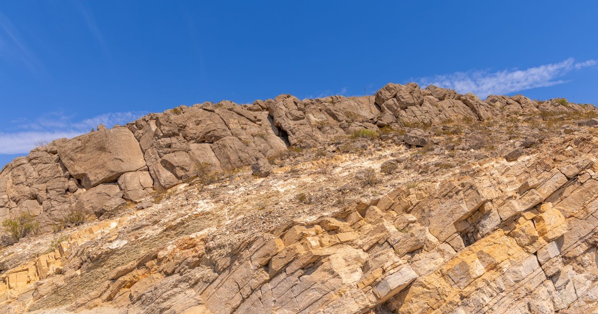 Rugged rocky landscape in El Paso, TX, showcasing arid natural beauty under a clear blue sky.